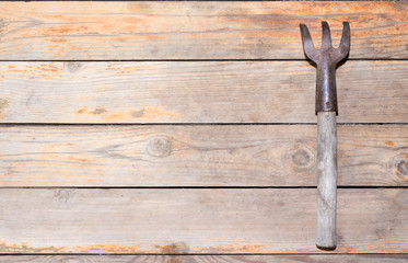 Wooden texture background with rake