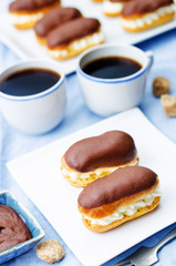 eclairs with cheese cream and chocolate glaze