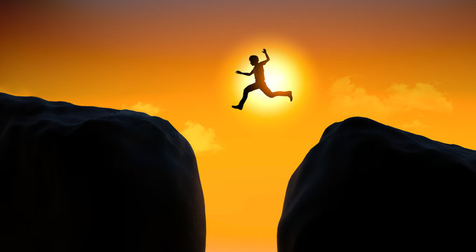 Man jumping at sunset
