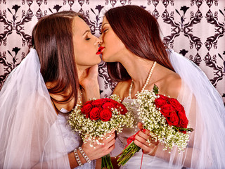 Wedding lesbians girl in bridal dress.