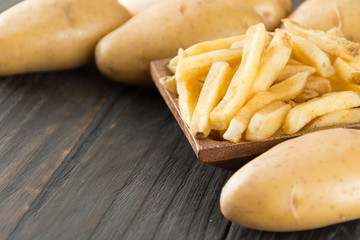 french fries on wood background