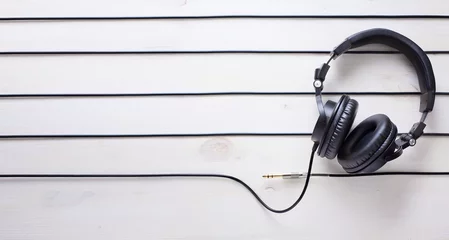 Tuinposter art music studio background with dj  headphones © Konstiantyn