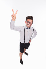 Handsome man showing yo sign in studio