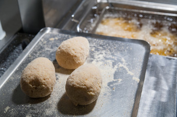 The making of sicilian arancini