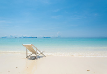 Fototapeta na wymiar chair beach on beach