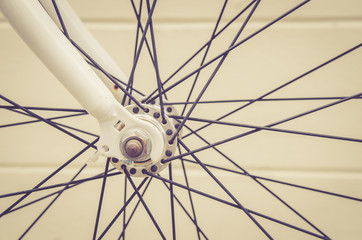 close up of bicycle wheels prosecc in vintage retro style