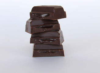 Chocolate blocks stack on white background