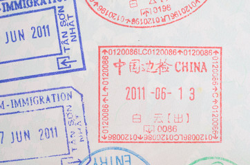 China visa passport stamp on Canadian passport close-up