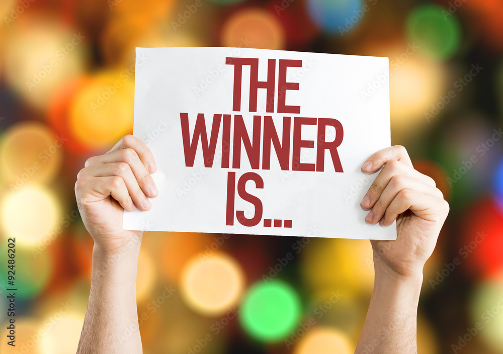 Wall mural the winner is... placard with bokeh background