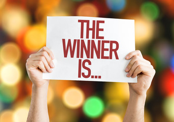 The Winner Is... placard with bokeh background - obrazy, fototapety, plakaty