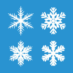 Collection of White Snowflakes and Blue Background.