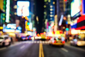 Blurred street llumination and night lights of New York City