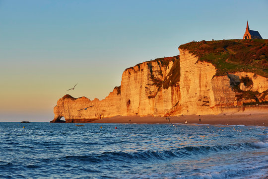 Scenic View Of Etretat Cliffs At Sunset