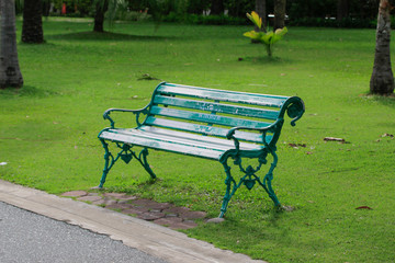 green chair in the garden