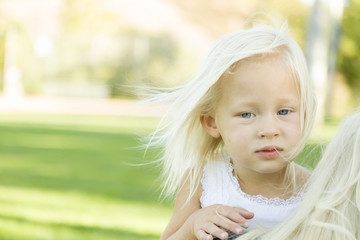 Melancholy Portrait of Cute Little Girl Outside