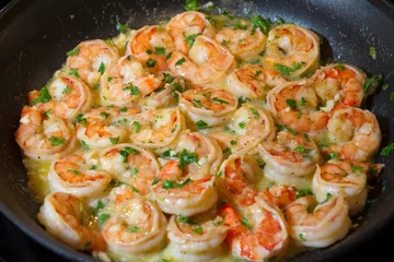 Wandaufkleber  shrimp scampi sauteed in butter and garlic © Jillian Cain