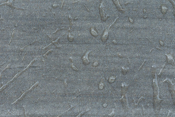 Textured background with water drops.