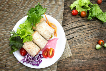 fresh whole wheat bread wraps with vegetables and fruit 