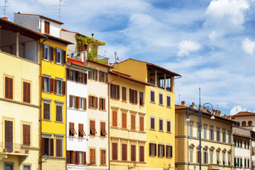 Fototapeta na wymiar Facades of medieval houses on the Piazza Santa Croce, Florence