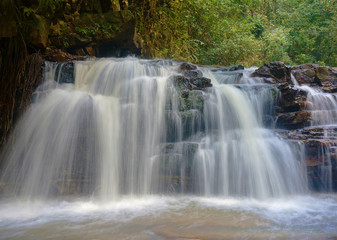 Fototapeta na wymiar Batu hampar waterfall. Symbol of nature