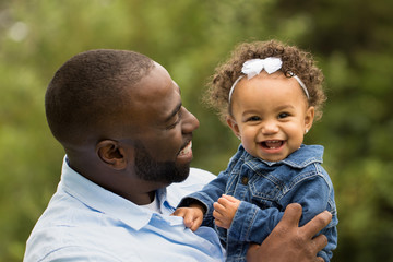 African American father and daughter