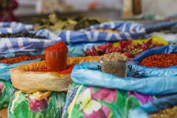 Fototapeta premium Beautiful vivid oriental market with bags full of various spices