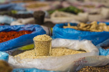 Fototapeta na wymiar Beautiful vivid oriental market with bags full of various spices