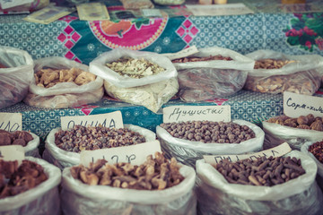 Beautiful vivid oriental market with bags full of various spices