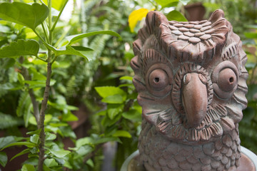 A terracotta owl garden accessories