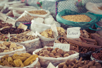 Beautiful vivid oriental market with bags full of various spices