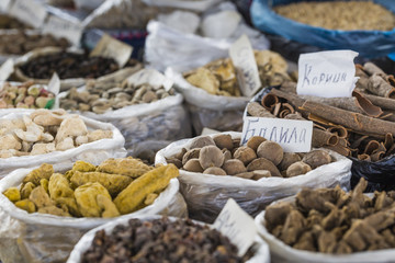Beautiful vivid oriental market with bags full of various spices