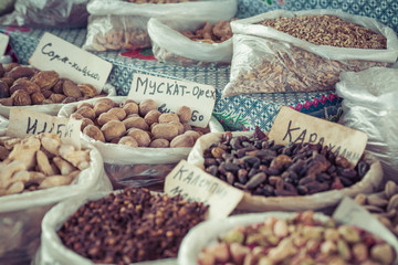 Beautiful vivid oriental market with bags full of various spices