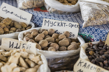 Beautiful vivid oriental market with bags full of various spices