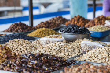 Dry fruits and spices like cashews, raisins, cloves, anise, etc.