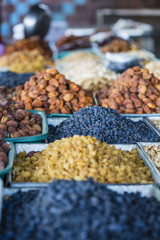Dry fruits and spices like cashews, raisins, cloves, anise, etc.