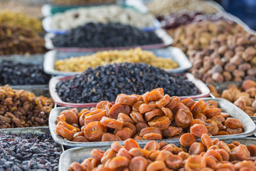 Dry fruits and spices like cashews, raisins, cloves, anise, etc.