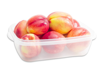 Tray with ripe nectarines