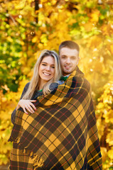 Fototapeta premium Falling in love autumn. smiling couple portrait