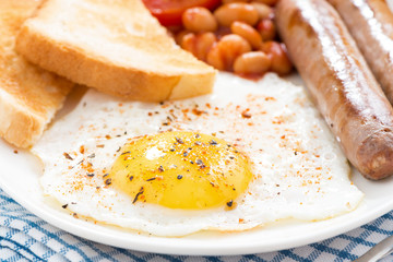 Traditional delicious English breakfast with sausages