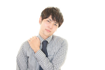 肩こりに悩む男性