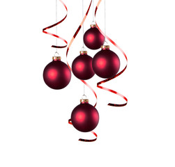 Christmas balls with curly ribbons isolated on the white background