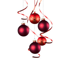 Christmas balls with curly ribbons isolated on the white background