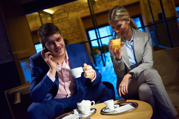 business couple take drink after work