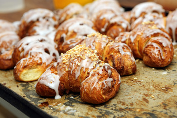 Fresh croissants iced with delicious cream