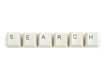 search from scattered keyboard keys on white