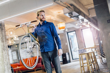 Fototapeta premium Using bicycle to go to work