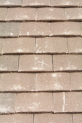 X mark on roof tiles to signify fixing point to wooden battens