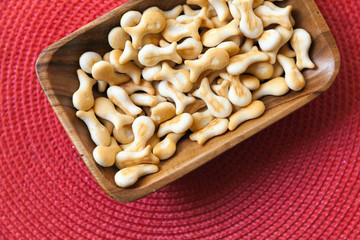 Small salty crackers in shape of fish, top view