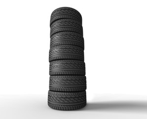 pile of tyres on black