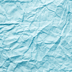 Crumpled blue paper